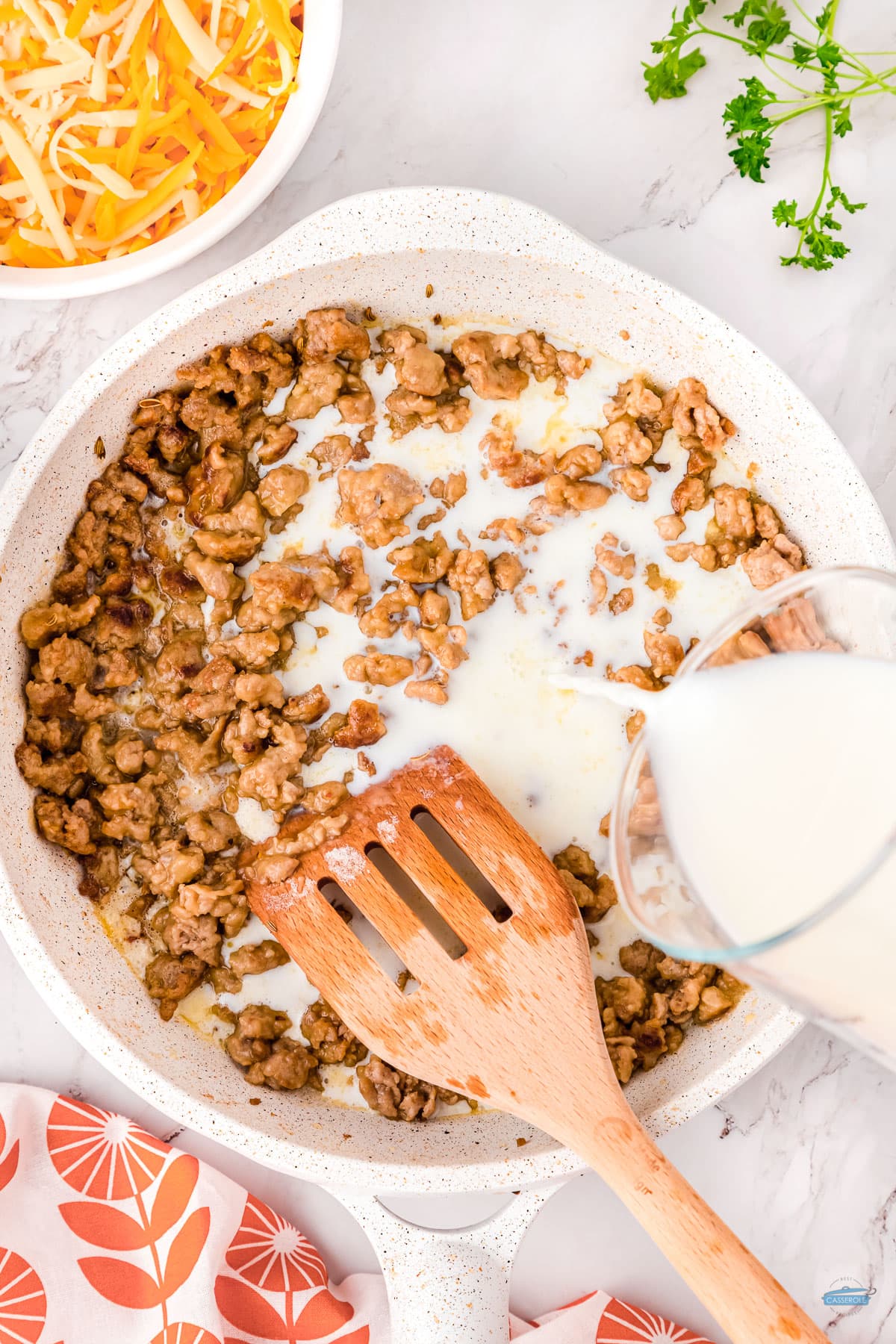 Making sausage with white gravy for biscuit and gravy casserole