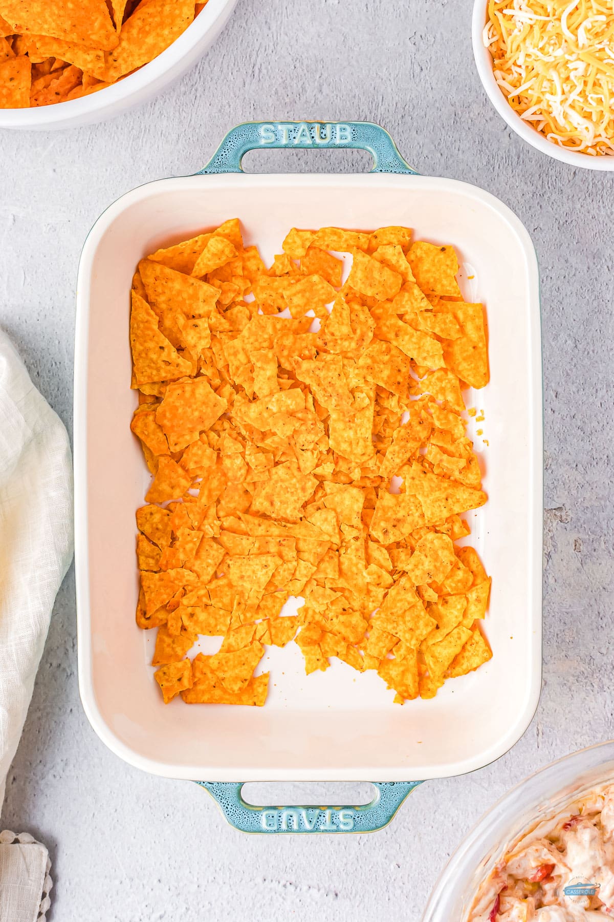 crushed dorito chips in a rectangle casserole dish