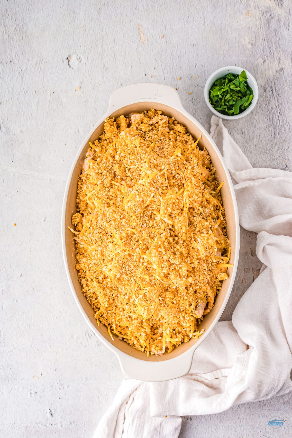 unbaked chicken tetrazzini in a white dish