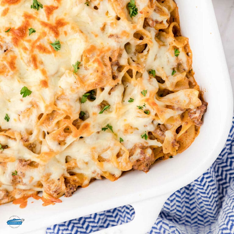 Close up of beef and noodle casserole garnished with parsley