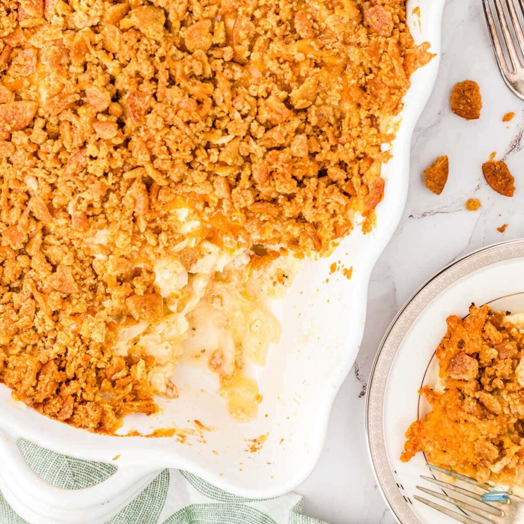 cabbage casserole in white dish with plate