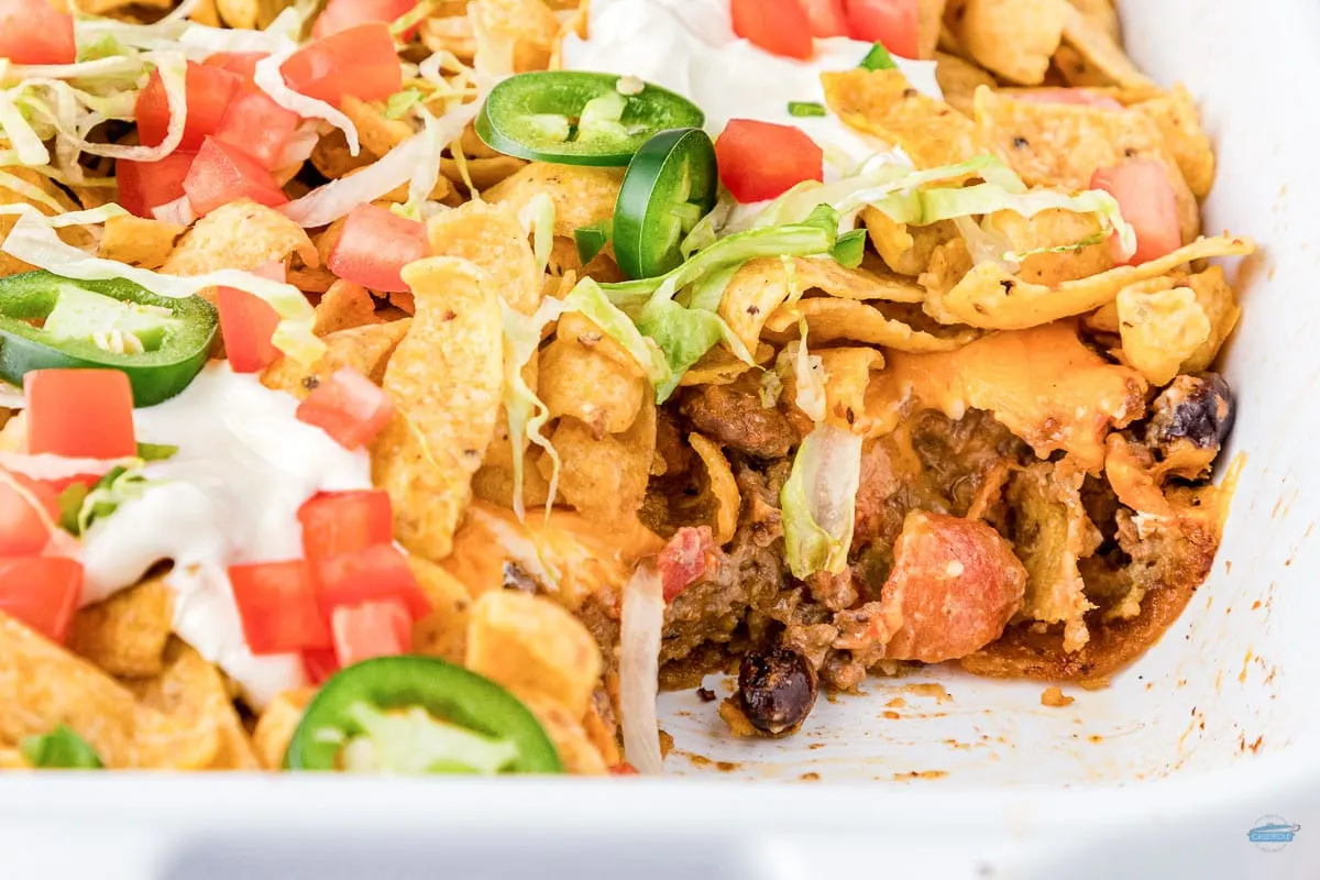 Close up showing the layers of a walking Frito casserole