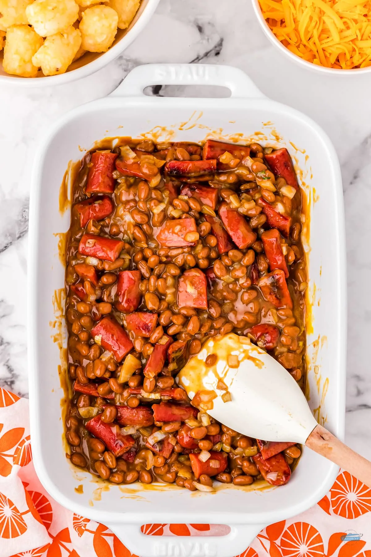 layer of franks and beans for a beanie weenie casserole