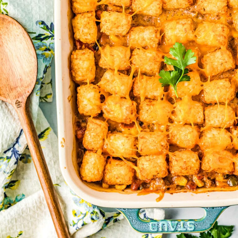 overhead picture of casserole with a wood spoon