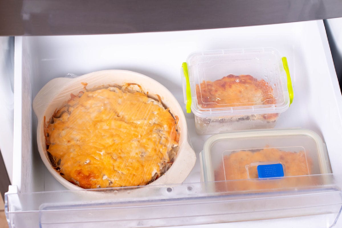 demonstration of different techniques for freezing leftover casserole