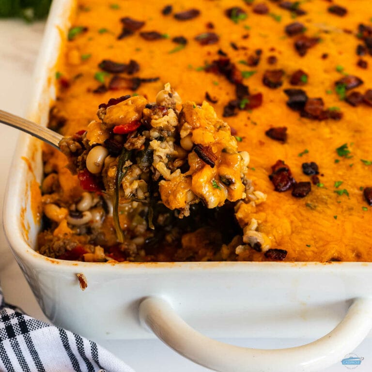 scoop of casserole in a white dish