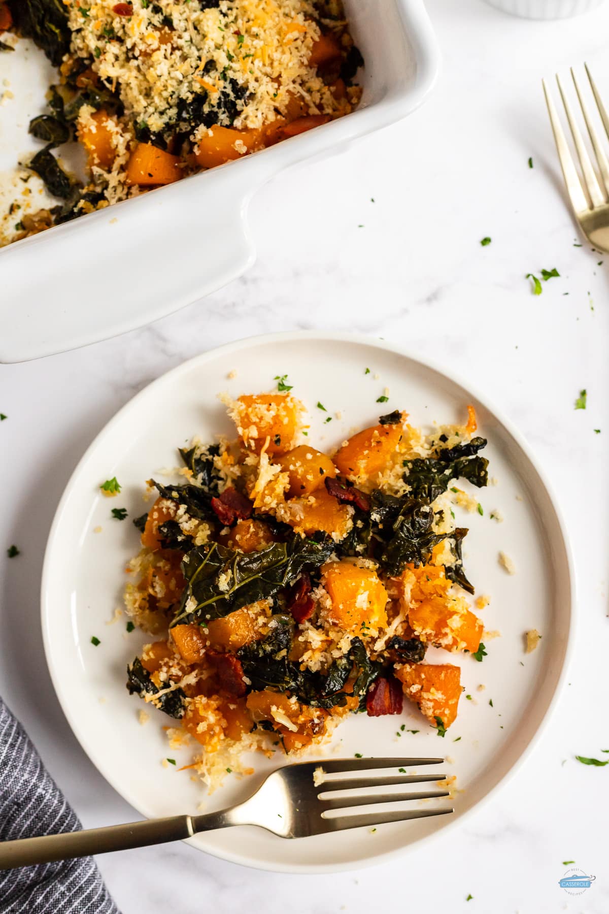 plate of squash and kale with a fork