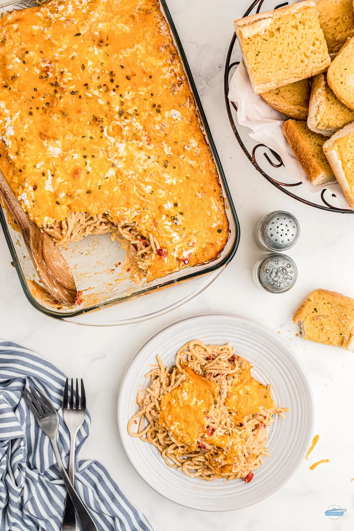 casserole dish with chicken spaghetti on a plate