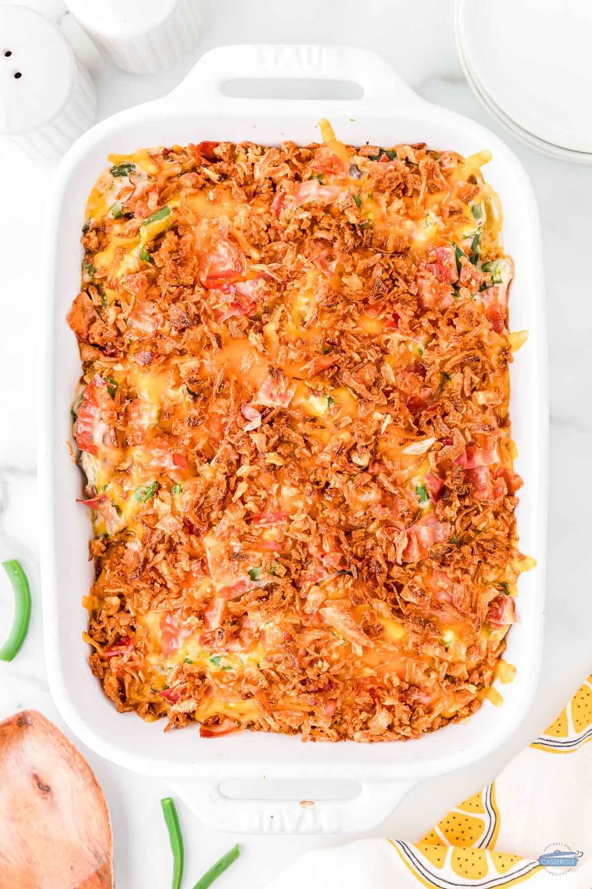 baked crack green bean casserole in a white rectangle dish