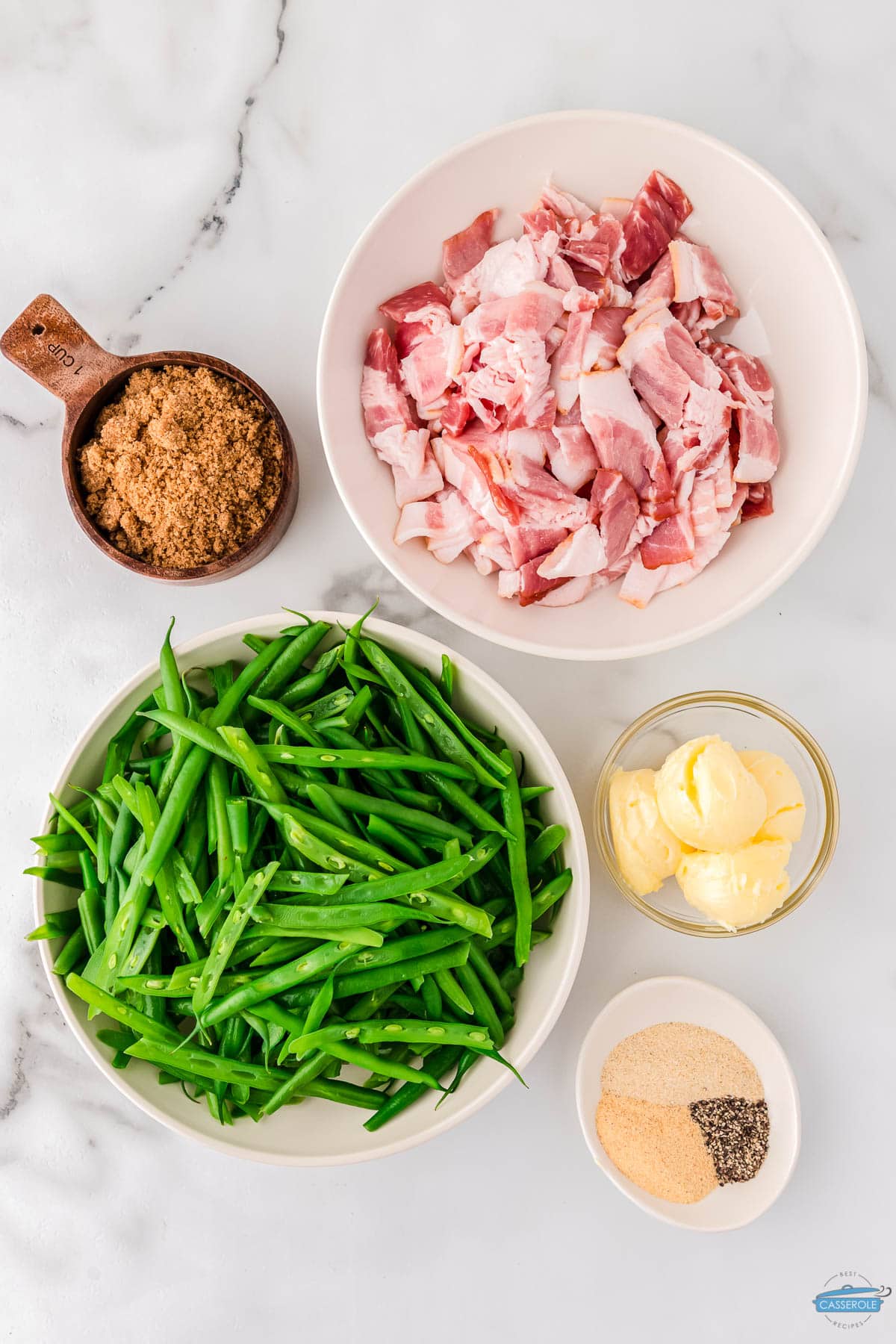 ingredients for green bean bundle casserole in individual bowls
