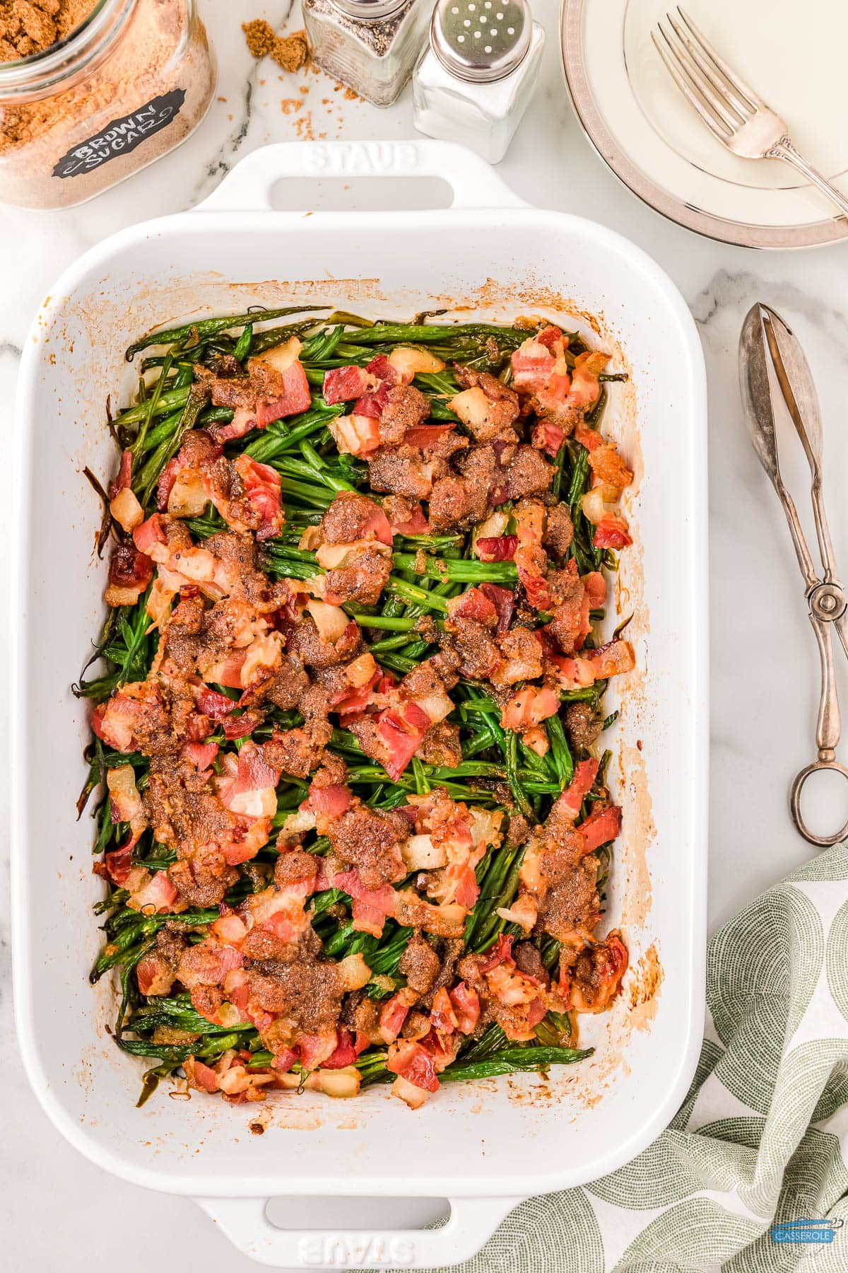 overhead picture of green bean bundle casserole in a white rectangle dish