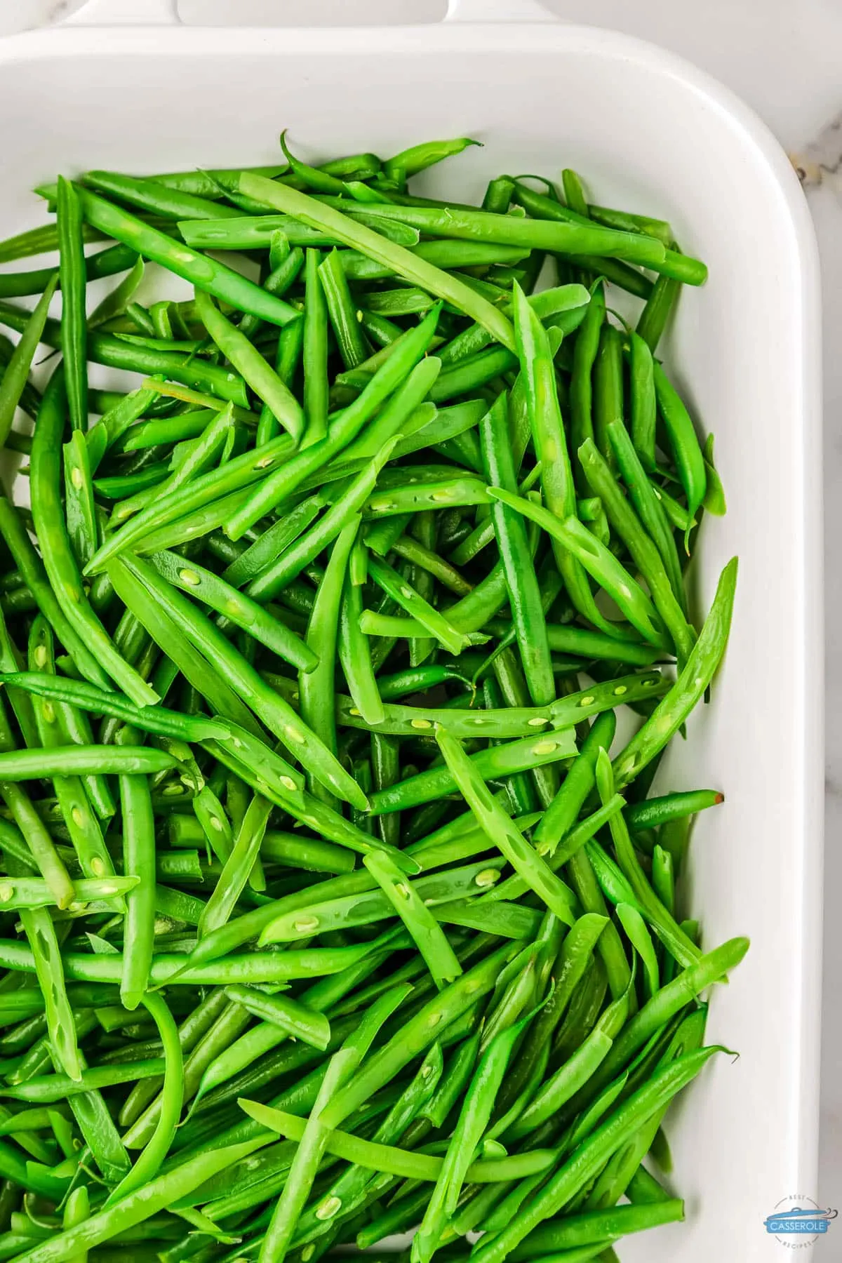 green beans in a white casserole dish