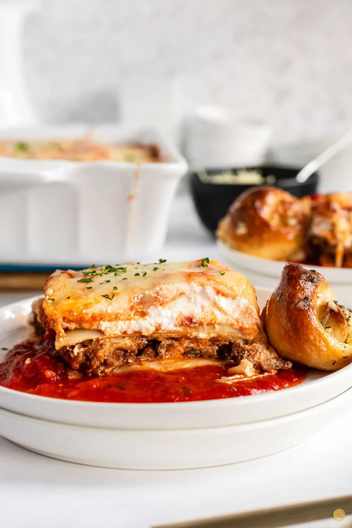 square of lasagna on a plate