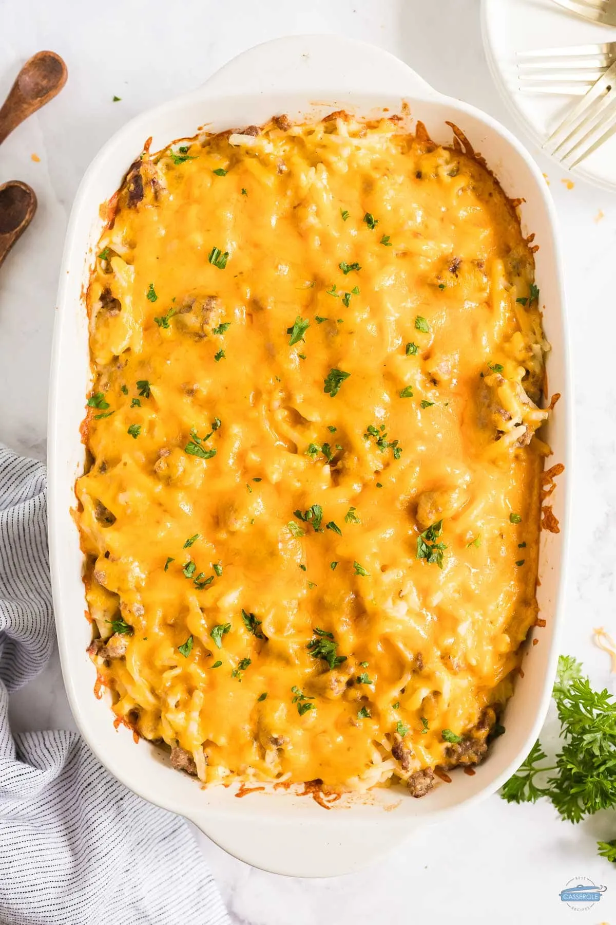 baked sausage breakfast casserole in a white rectangle dish
