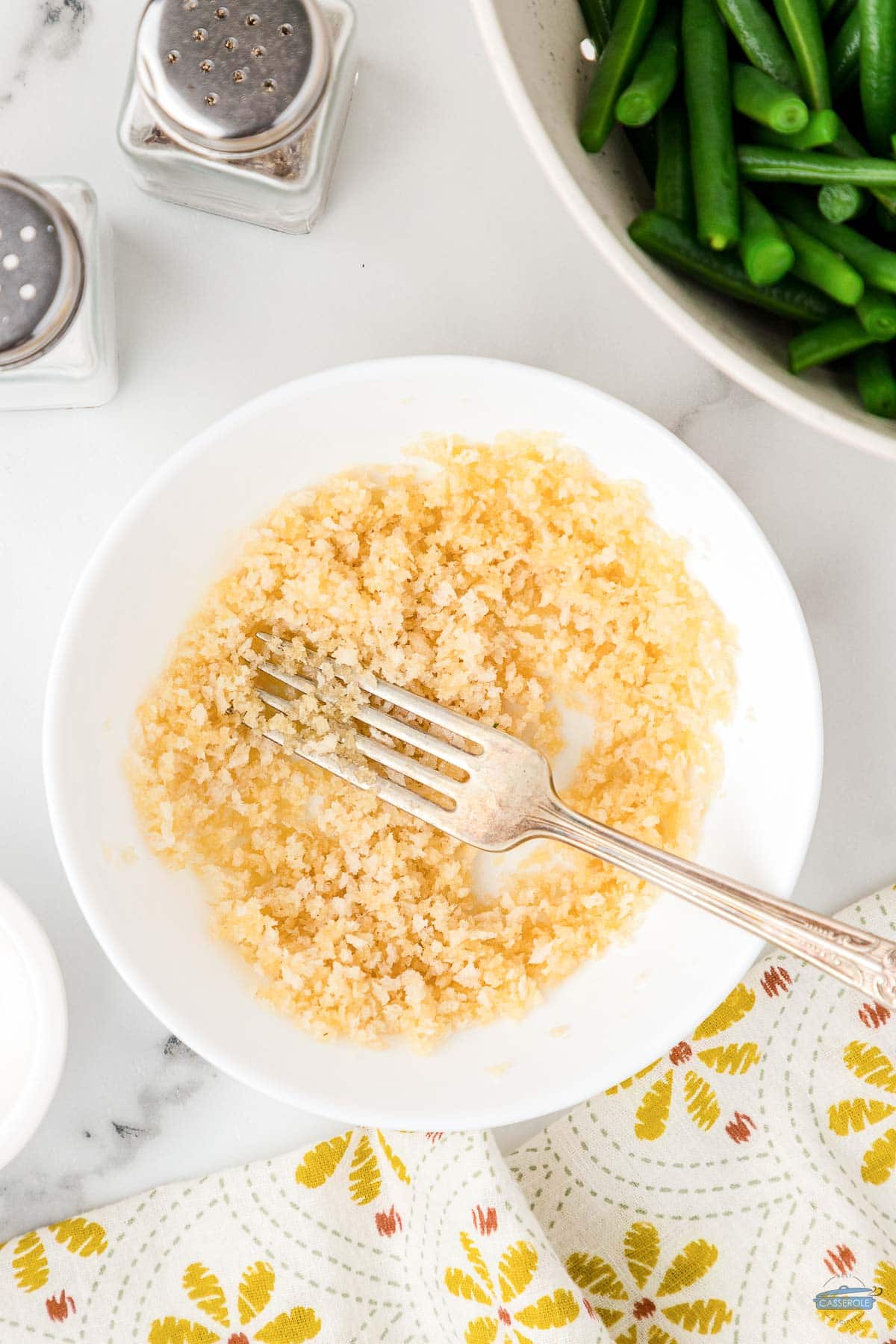 panko and melted butter in a shallow dish