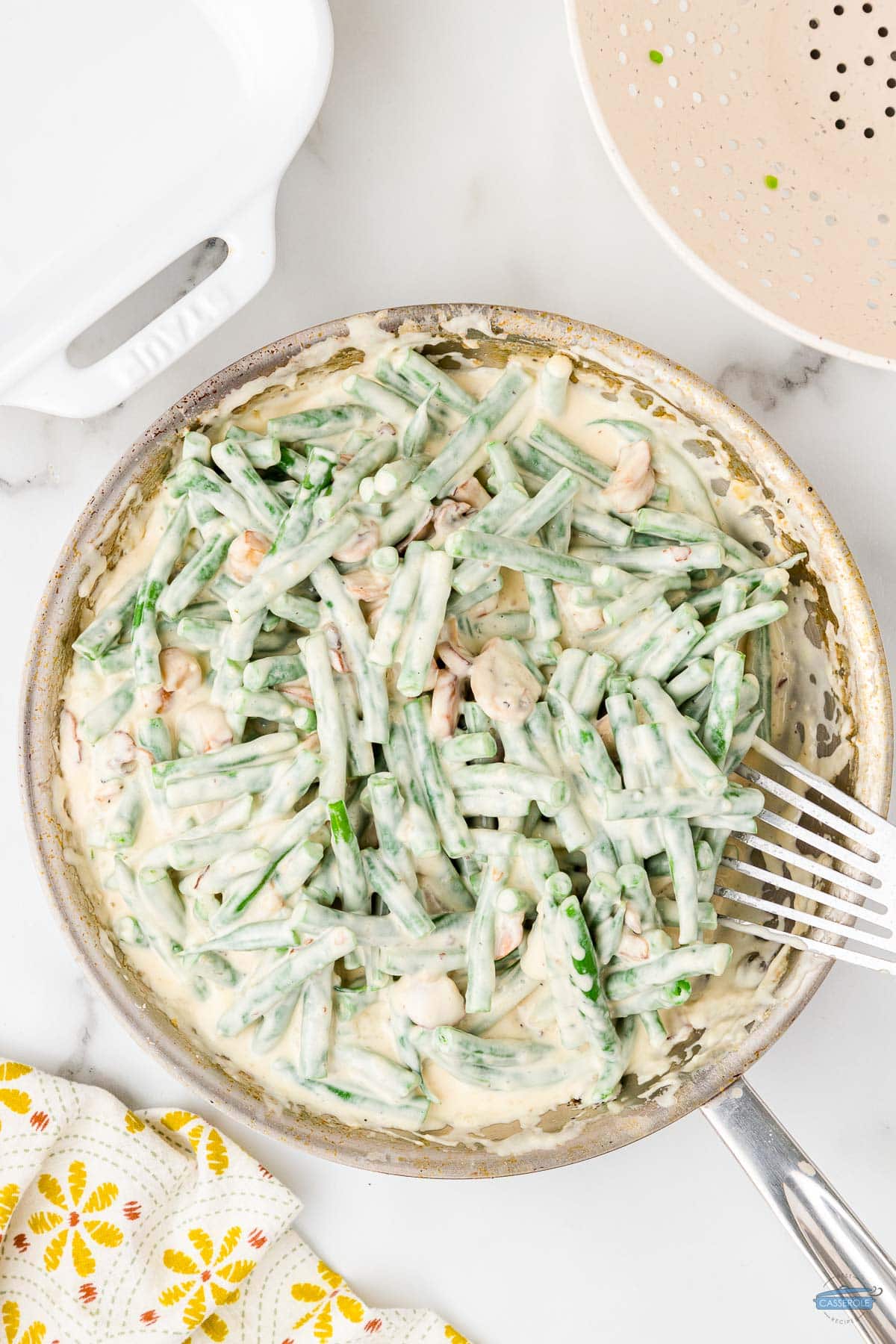 green beans and sauce in a skillet