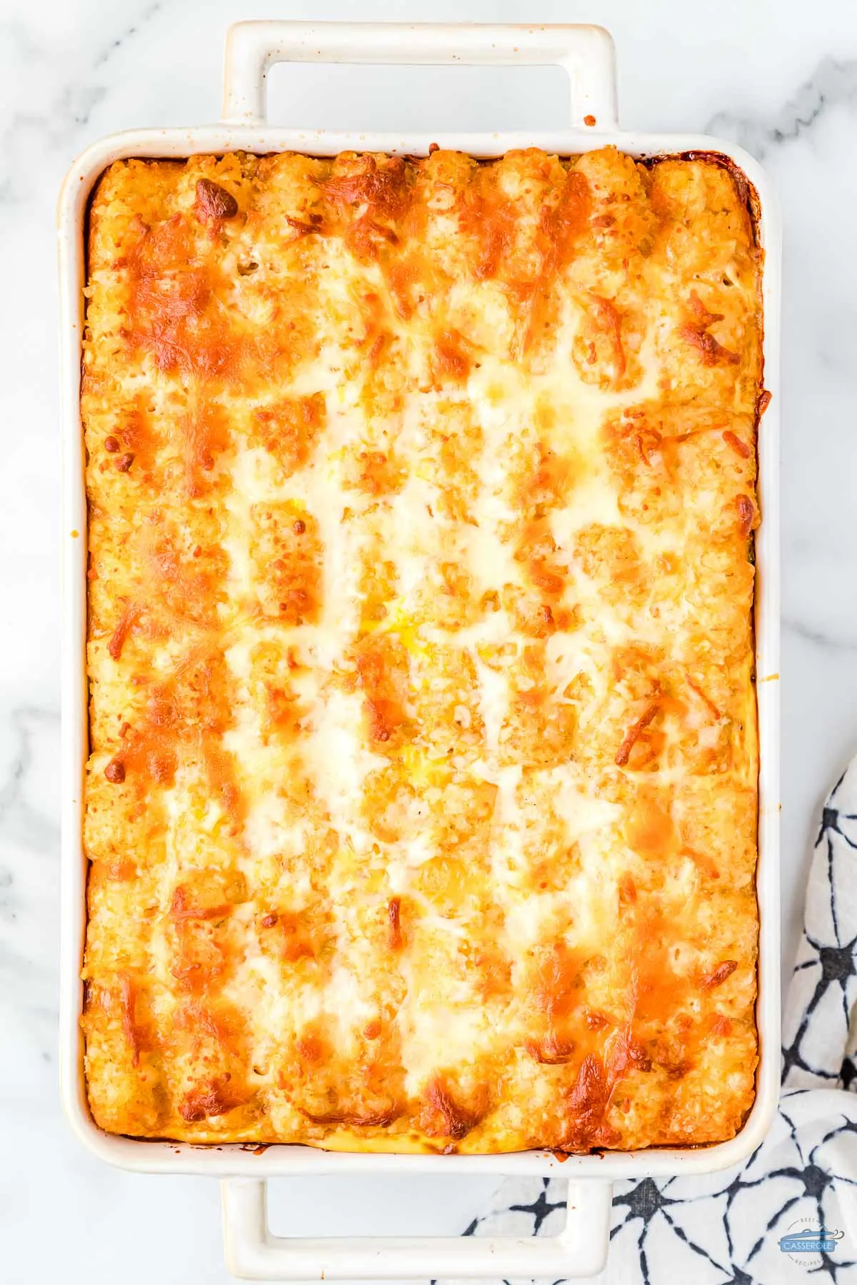 baked corned beef hash casserole in w white rectangle dish