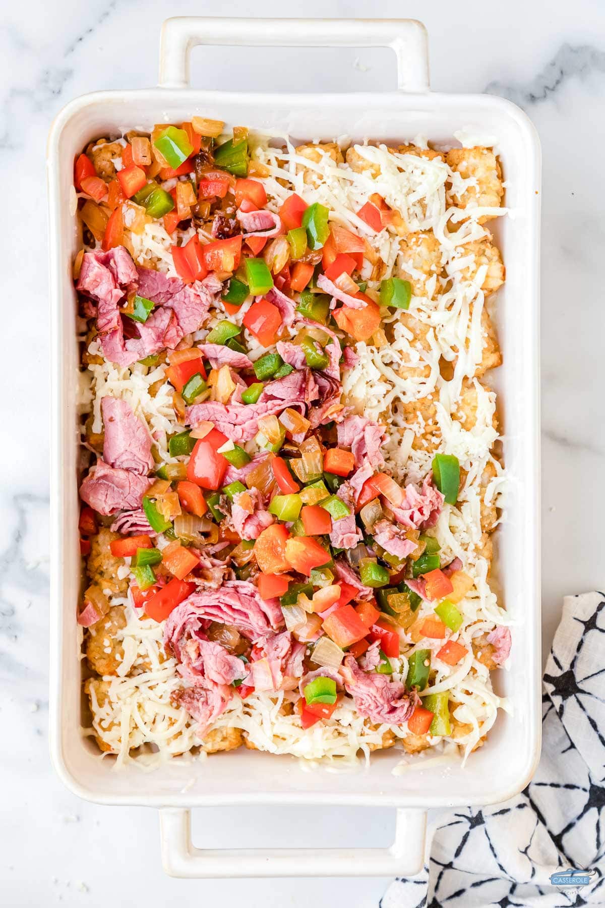 layers of brown potatoes and corned beef