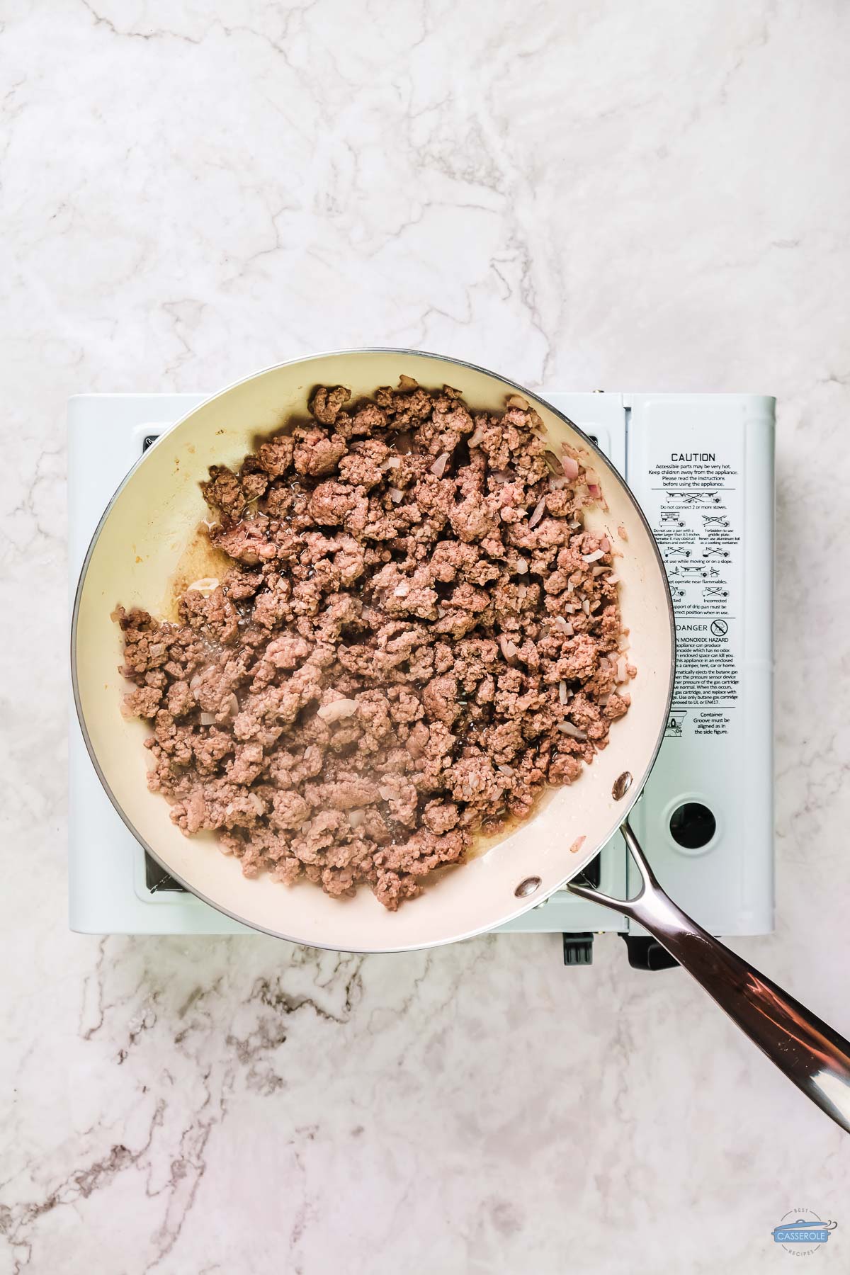 cooked ground beef in a skillet