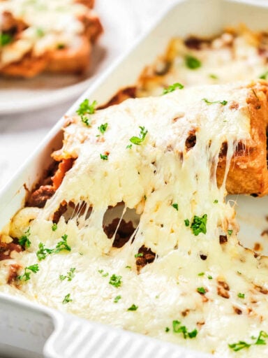 square of casserole with cheese and ground beef