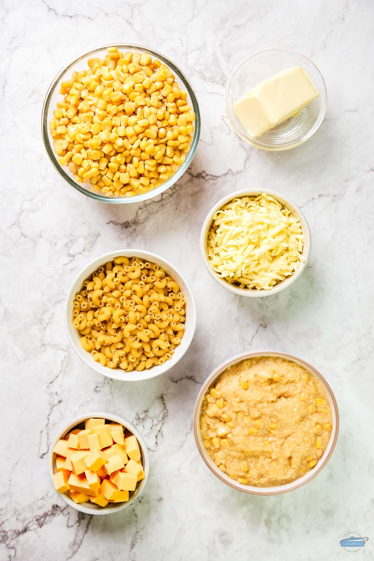 ingredients for corn pudding in bowls
