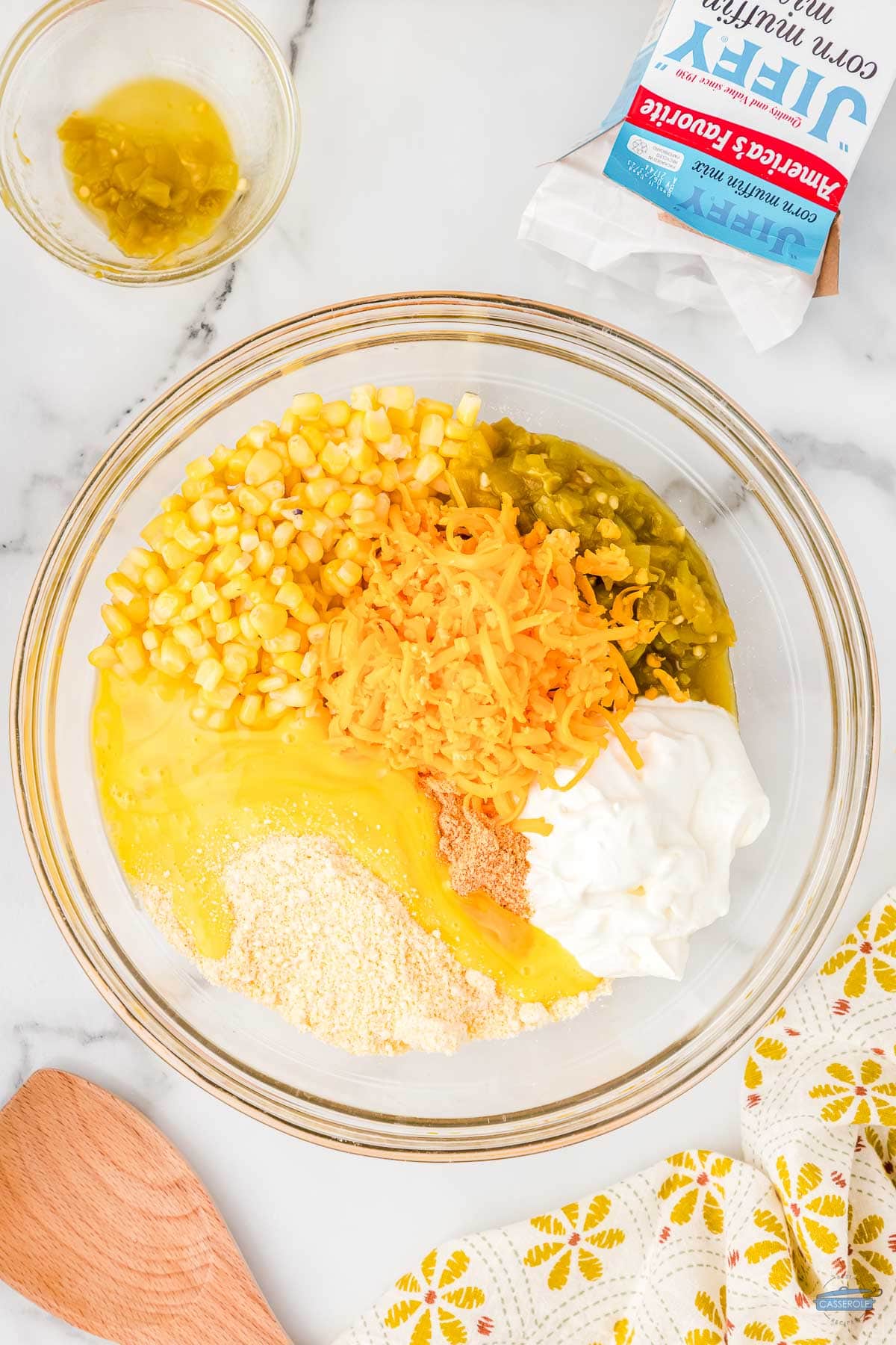 cream corn and cheese in a bowl