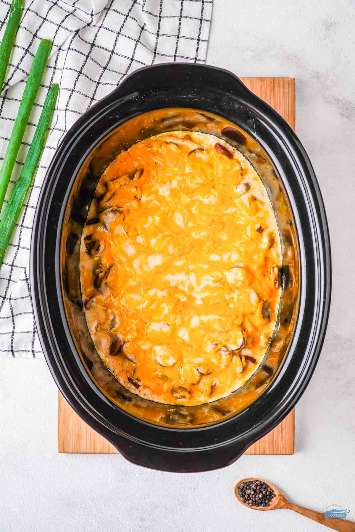 layer of cheese in slow cooker