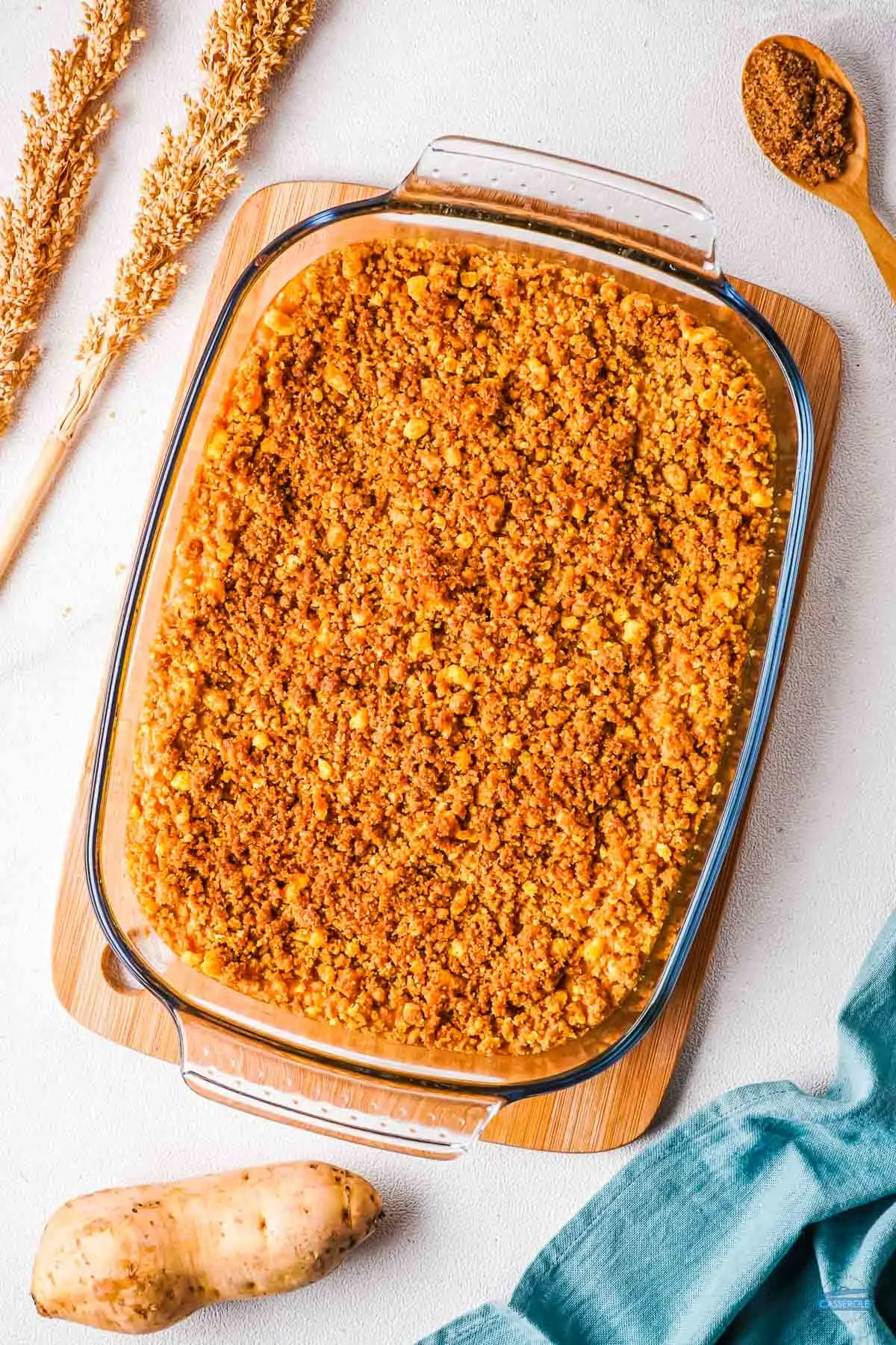 baked Captain Crunch Casserole in a clear dish with a blue napkin