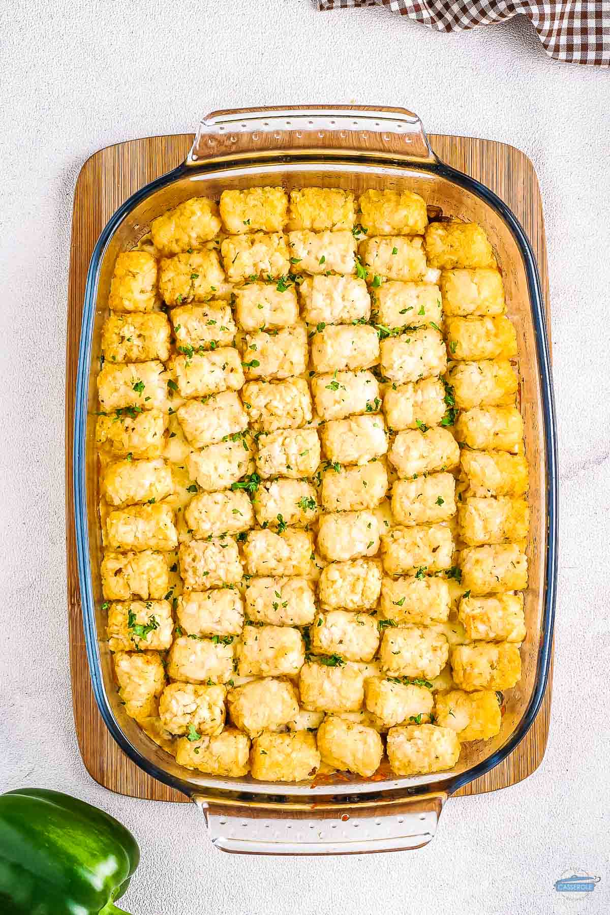 philly cheesesteak tater tots casserole baked in a dish