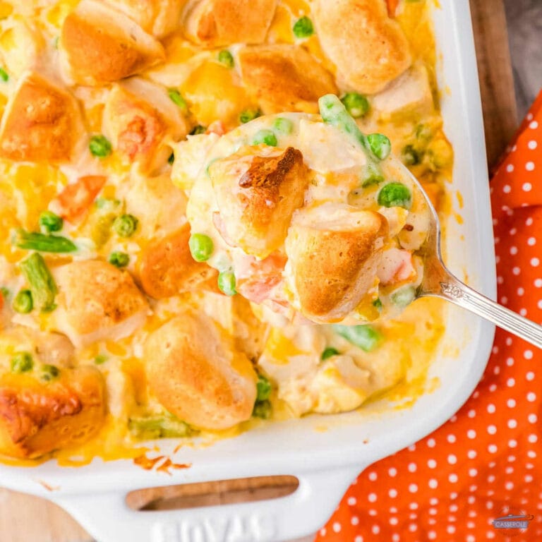 chicken pot pie bubble up casserole in a white baking dish