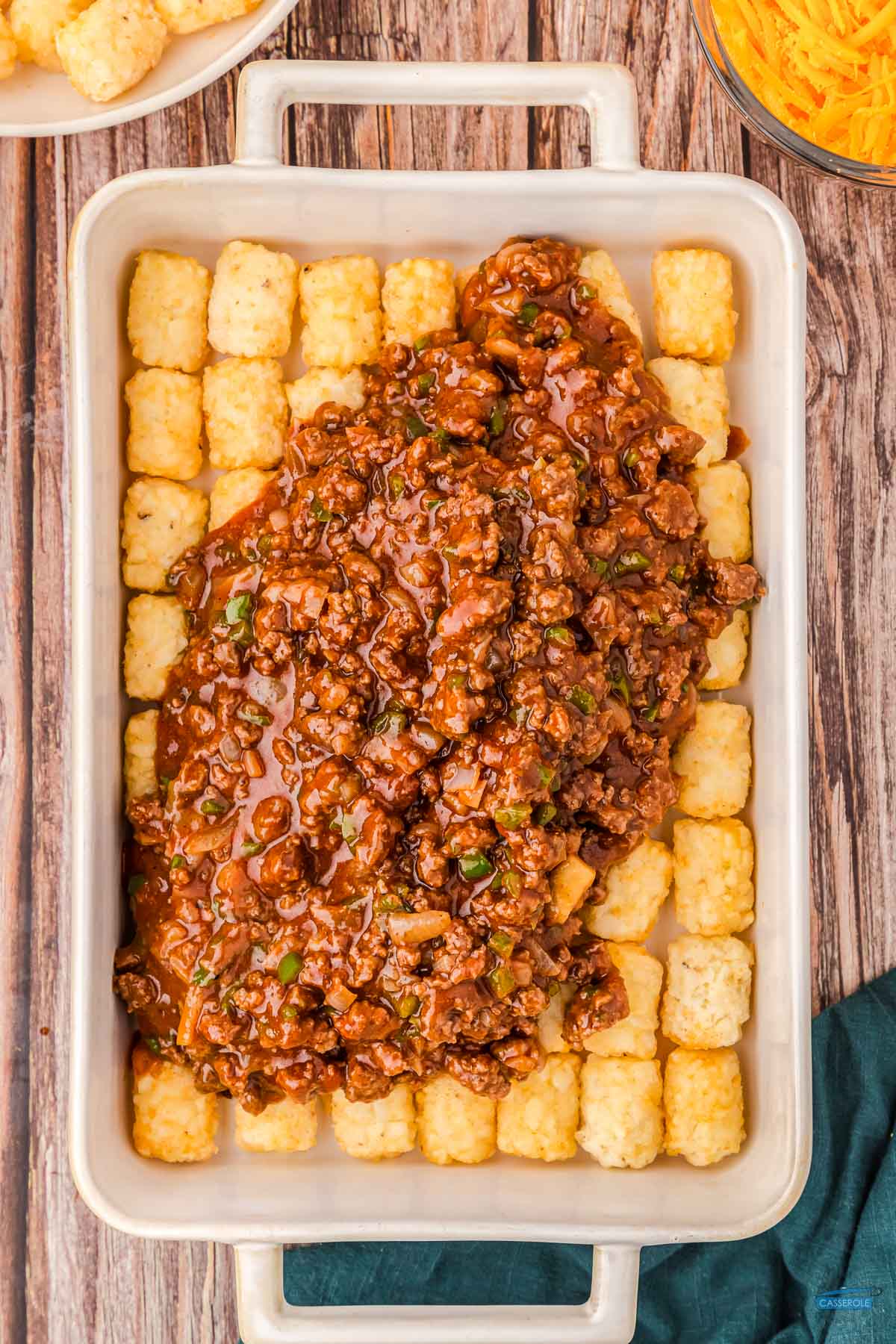 layer the sloppy joe mixture over a layer of tater tots