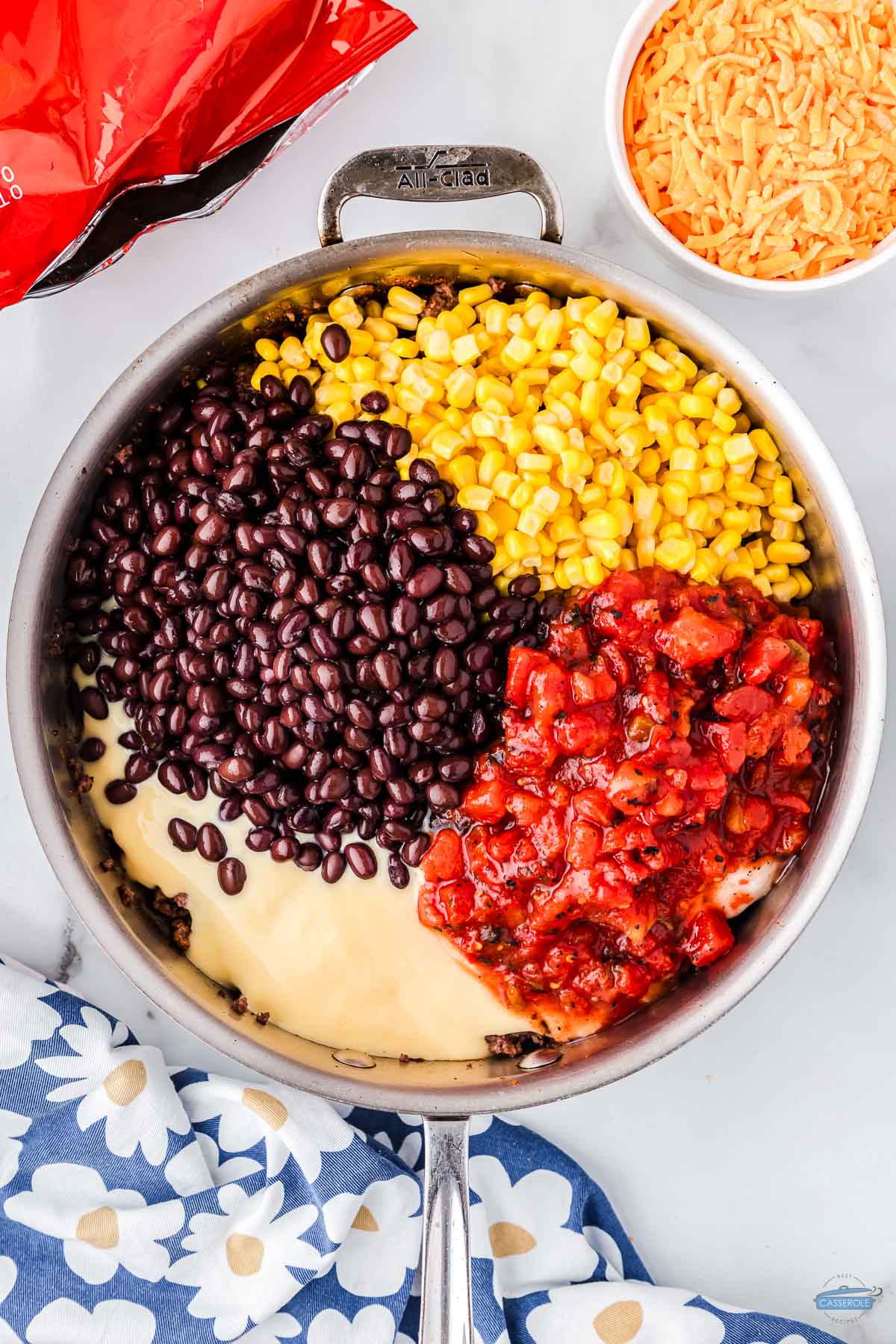 skillet with beans, corn, and diced tomatoes