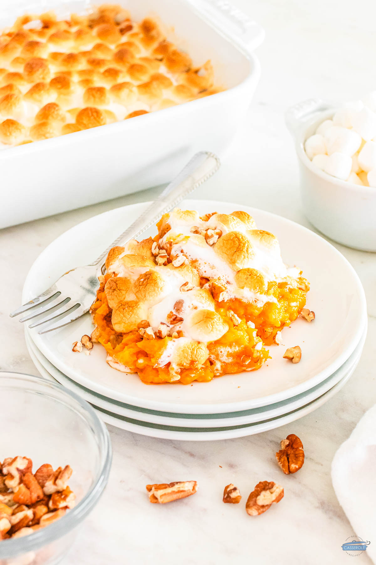 sweet potato casserole on a stack of plates